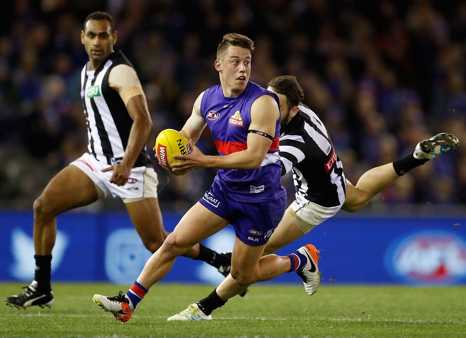 AFL 2016 Rd 21 - Western Bulldogs v Collingwood MELBOURNE, AUSTRALIA - AUGUST 12: Nathan Hrovat of the Bulldogs in action during the 2016 AFL Round 21 match between the Western Bulldogs and the Collingwood Magpies at Etihad Stadium on August 12, 2016 in Melbourne, Australia. (Photo by Adam Trafford/AFL Media)